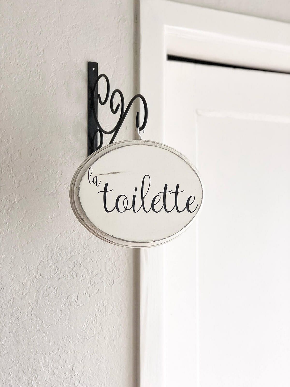 Add a bit of French panache to the bathroom with a custom sign!