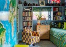 boys bedroom world map on wall funky patterned chair bed bookshelf train lanterns