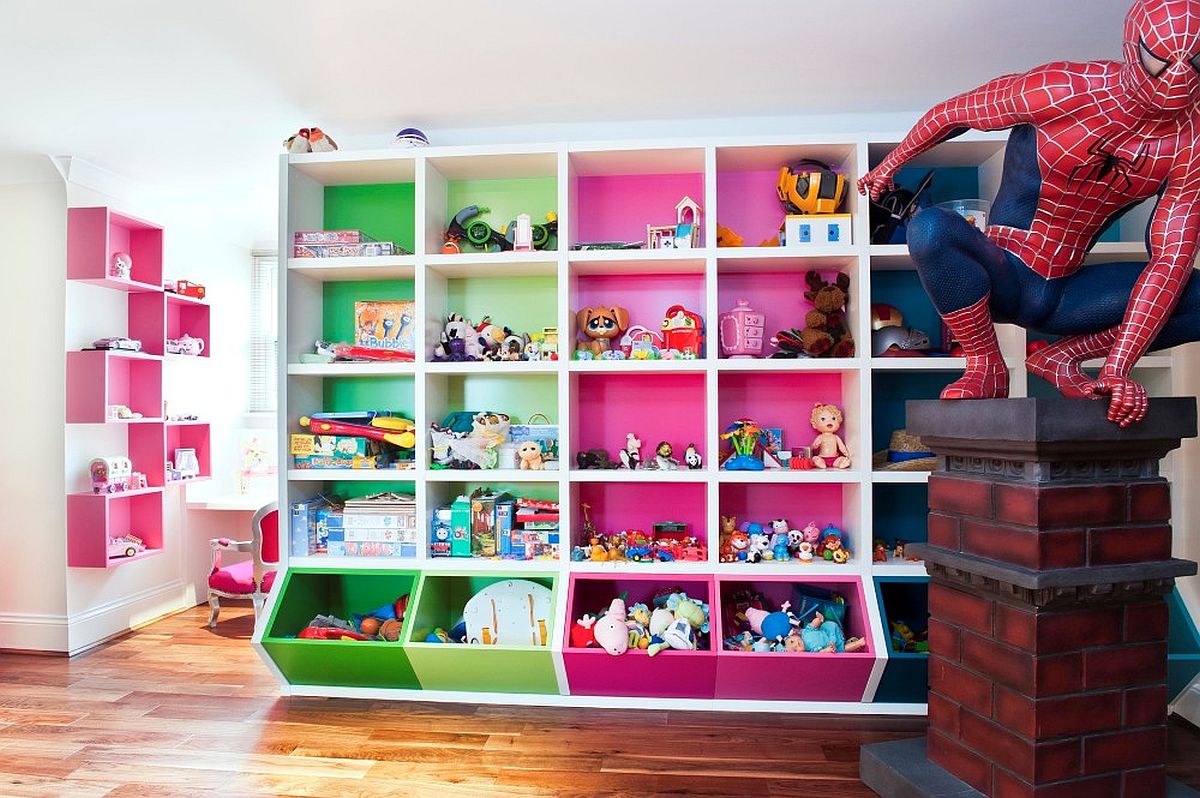 Colorful wall of shelves creates a fabulous focal point in this kids' room and playarea