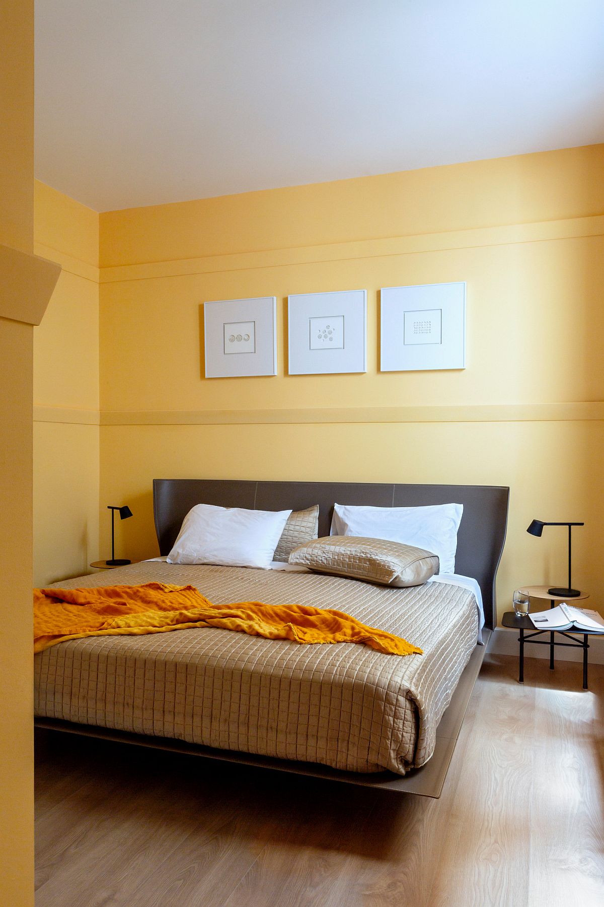 Contemporary-bedroom-in-white-and-yellow-with-wooden-floor-74859