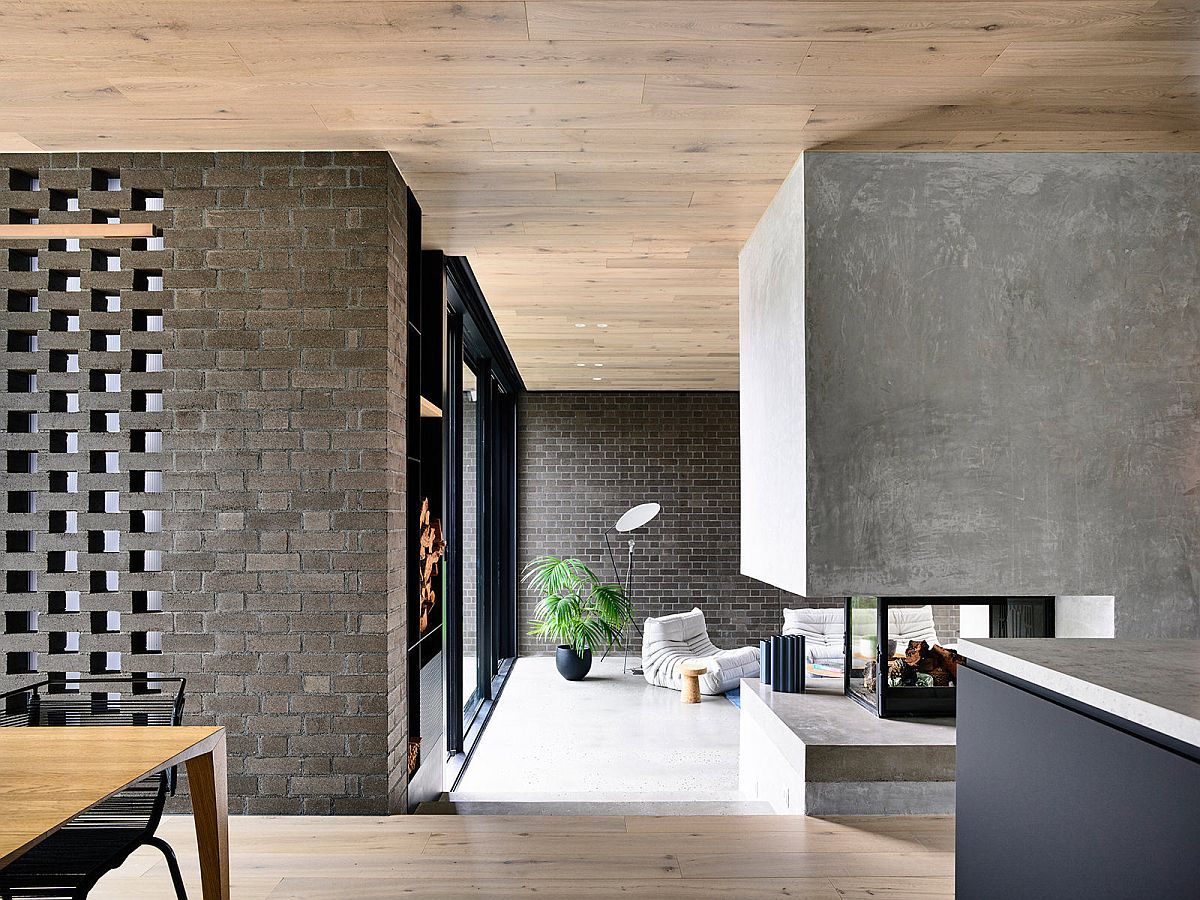 Contemporary interior of the home in concrete, brick, glass and timber