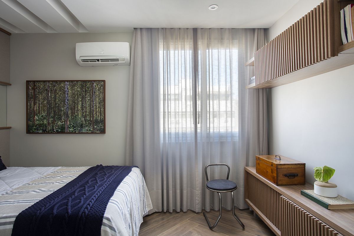 Custom cabinets in the bedroom add another space-saving feature to the interior