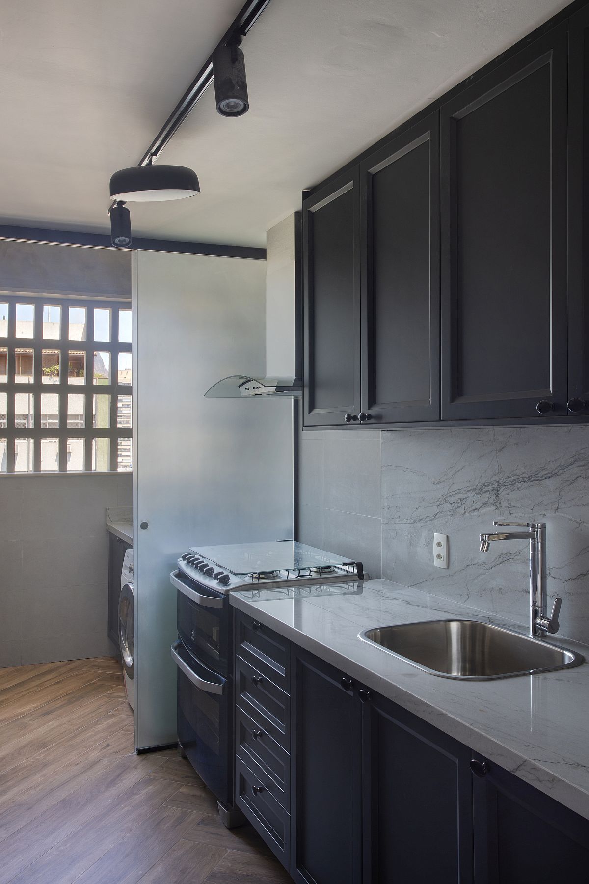 Finding space for the laundry unit inside the kitchen