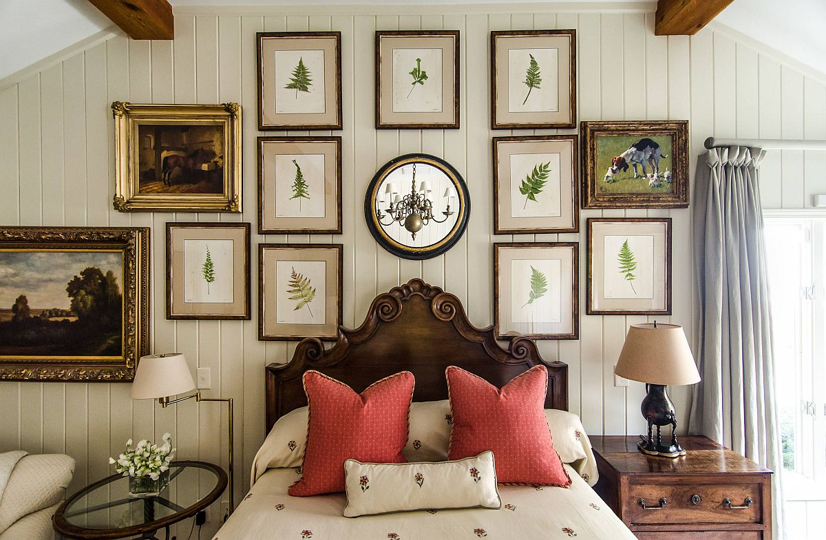 Framed botanicals in the backdrop add a green tinge to the bedroom