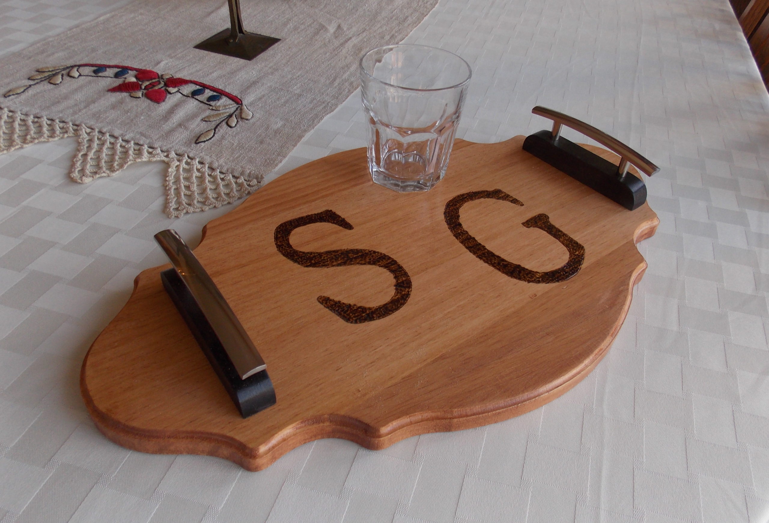 Glass on top of monogrammed wood tray with side handles