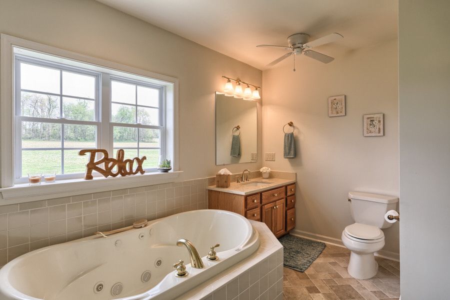 Gorgeous Relax style on the window next to the bathtub moves away from the mundane!