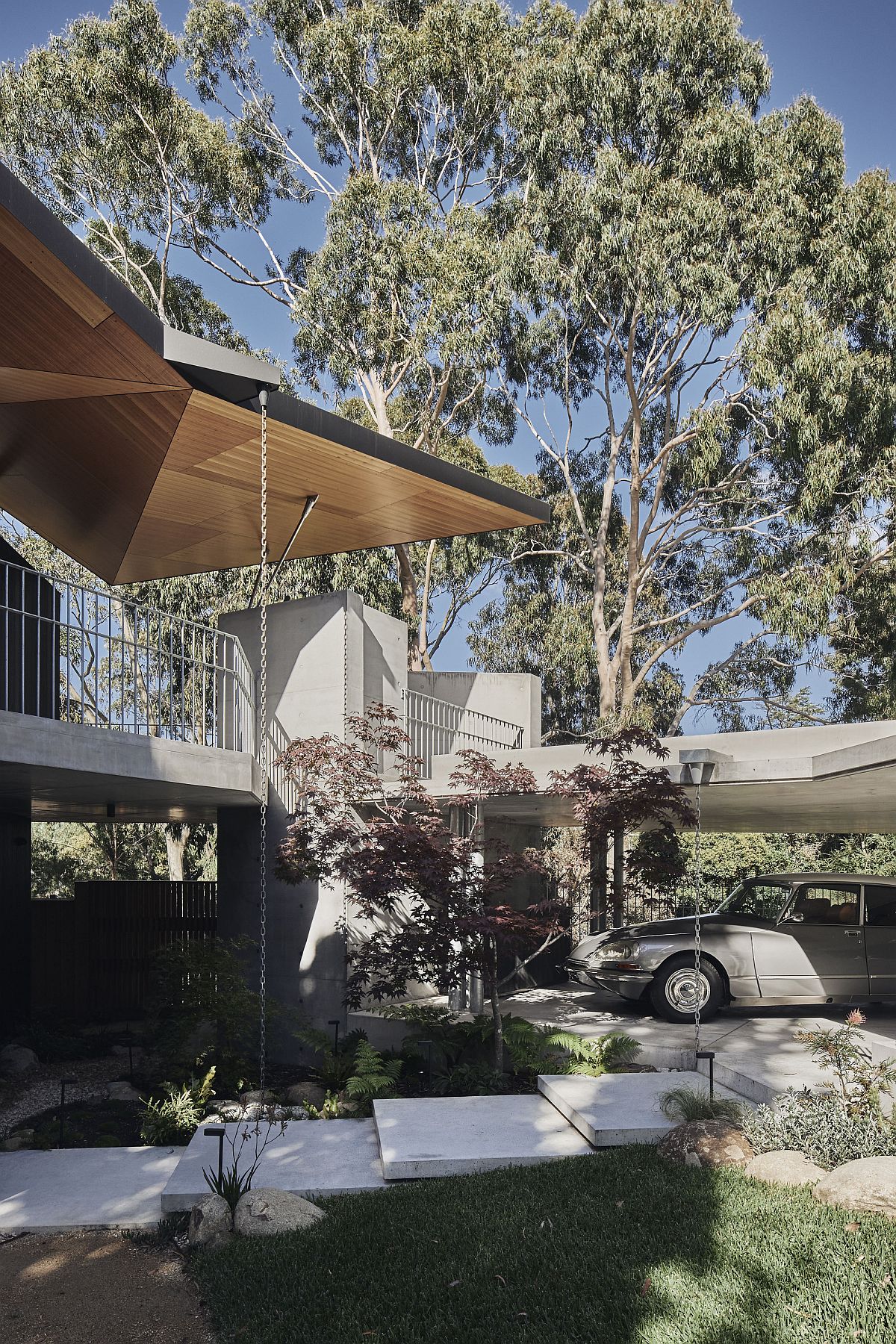 Green outdoors and entry of the unique Aussie home that feels different