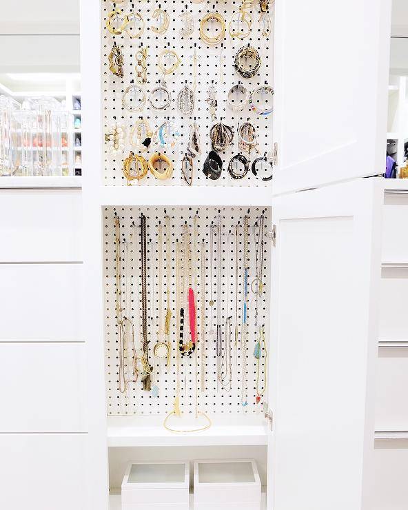 jewelry pegboard hanging organizer in white closet