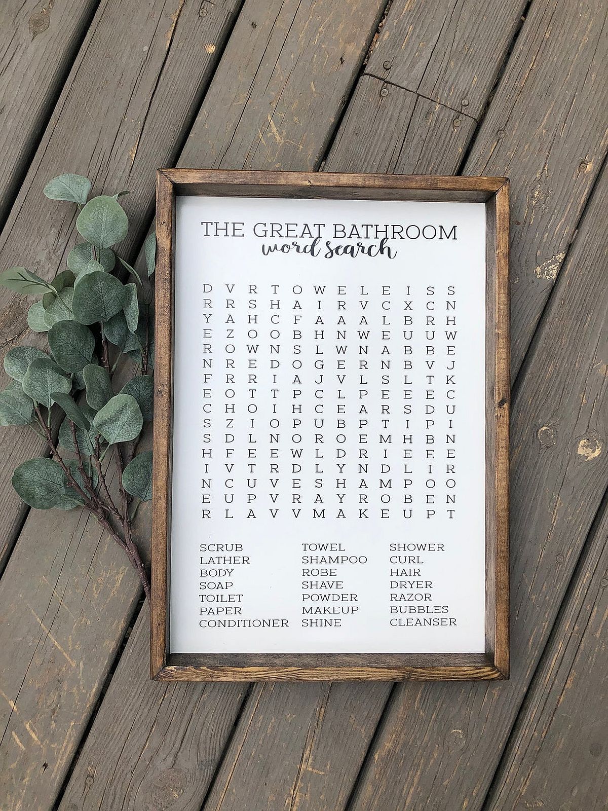 Keep yourself busy in the bathroom without a smartphone using crossword bathroom sign