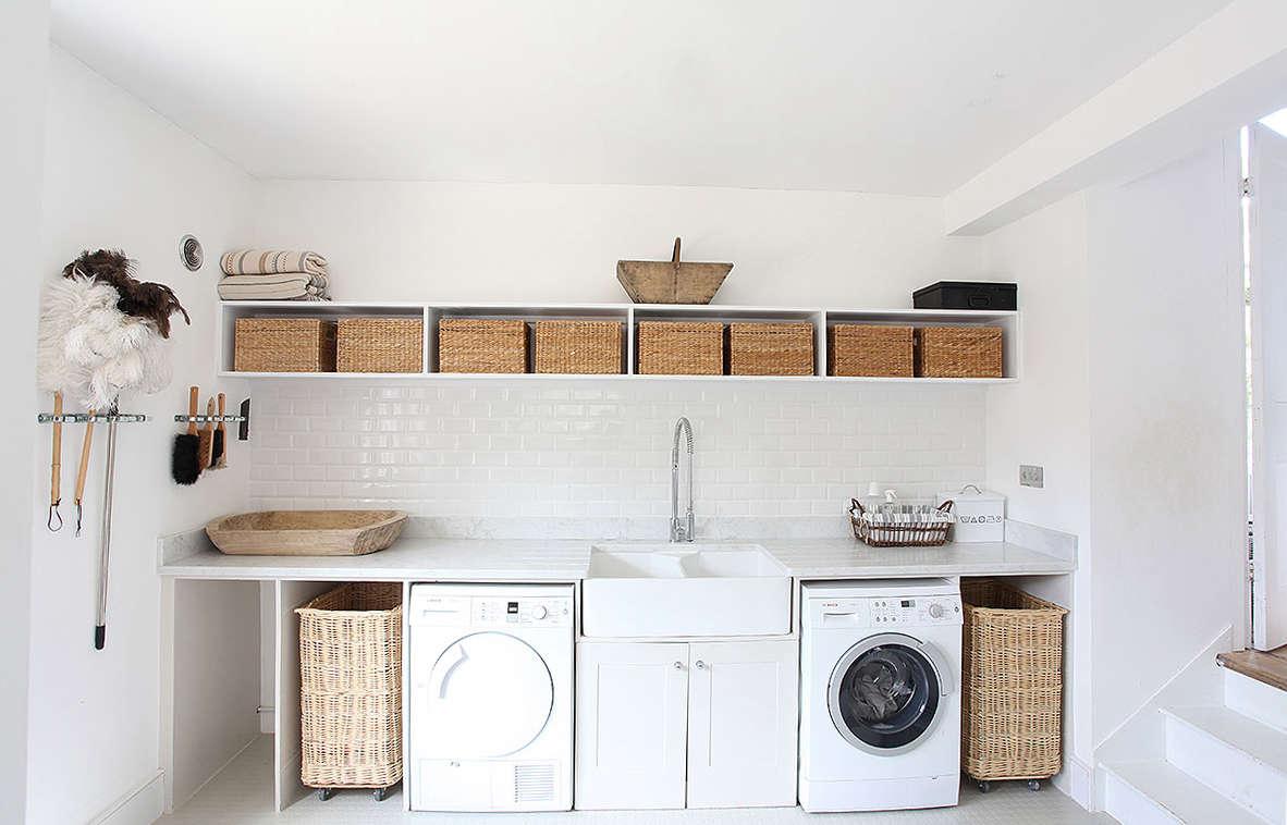 Laundry room full of wicker baskets