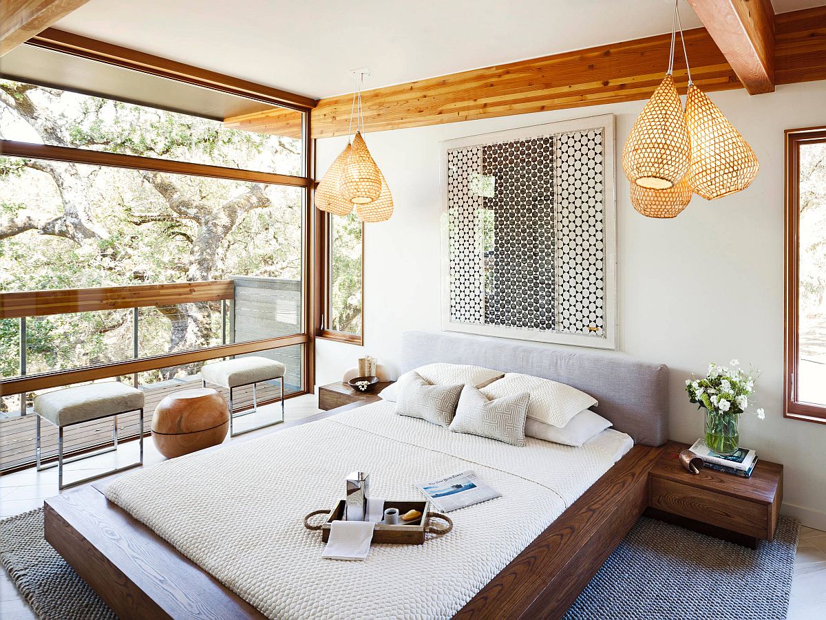 Light-filled and modern bedroom with simple Scandinavian style that has a Zen-inspired look