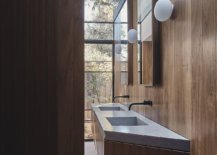 Minimal-bathroom-of-the-house-with-floating-wooden-vanity-and-a-view-of-the-outdoors-44053-217x155