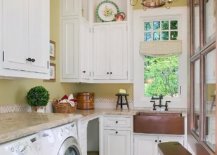 Modern laundry room with chandelier