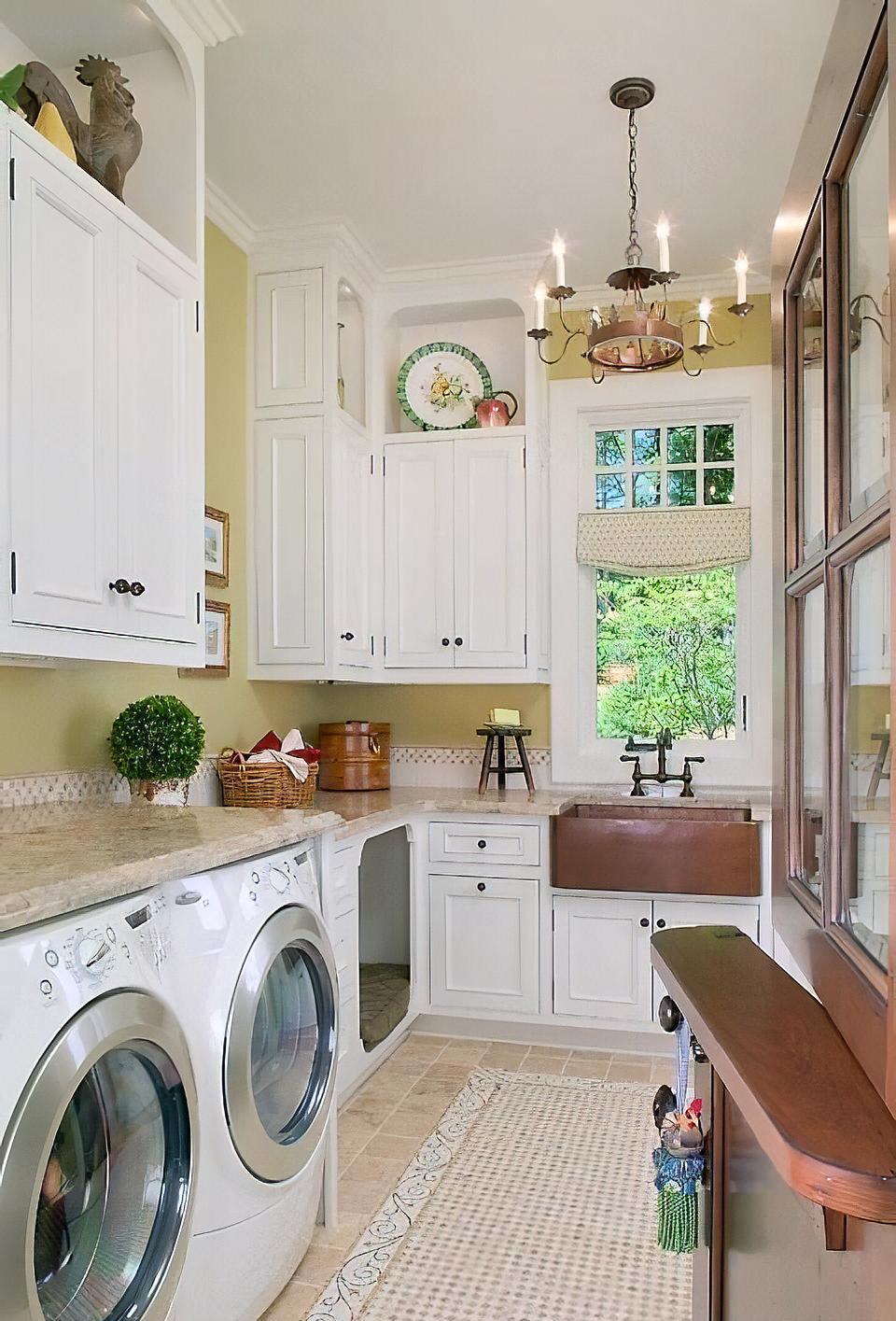 Modern laundry room with chandelier