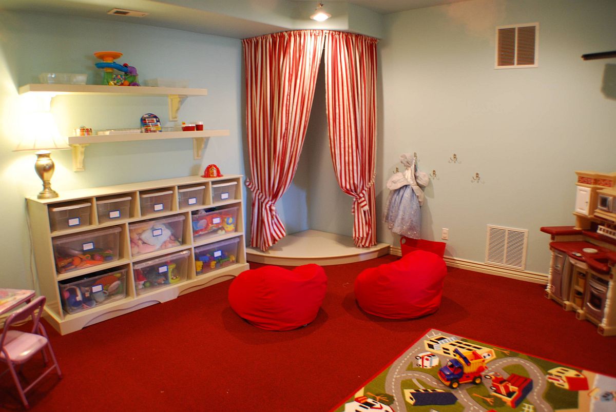 Neatly stacked storage boxes in the kids' room occupy the small shelves and make things accessible for kids