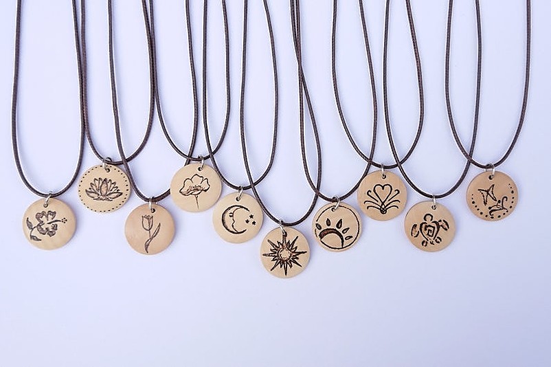 Necklaces with round wood pendants