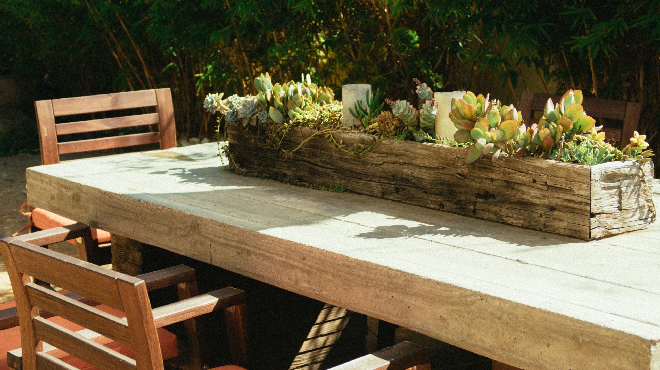 wooden plant box on outdoor table