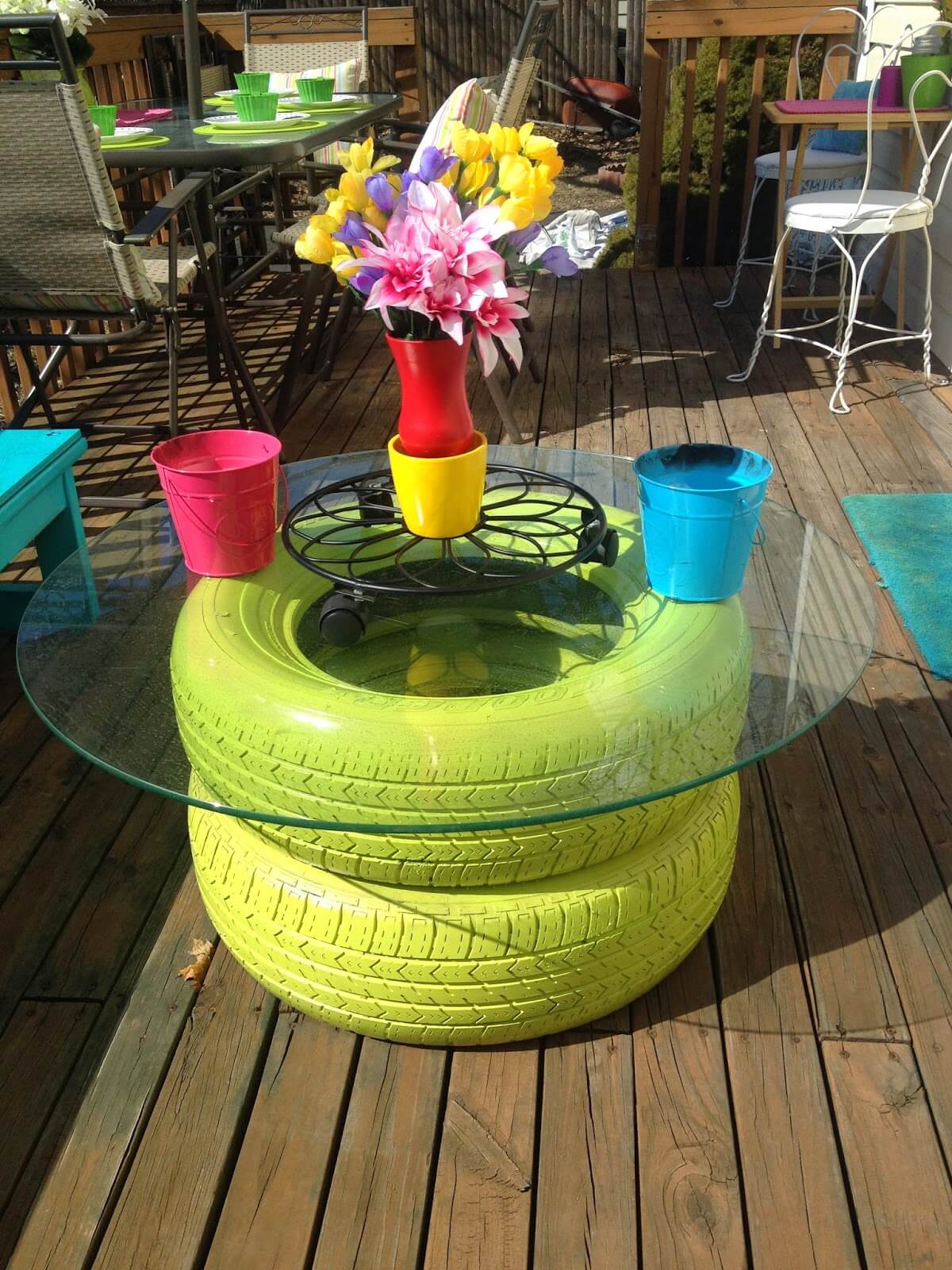 round glass table with repurposed tires