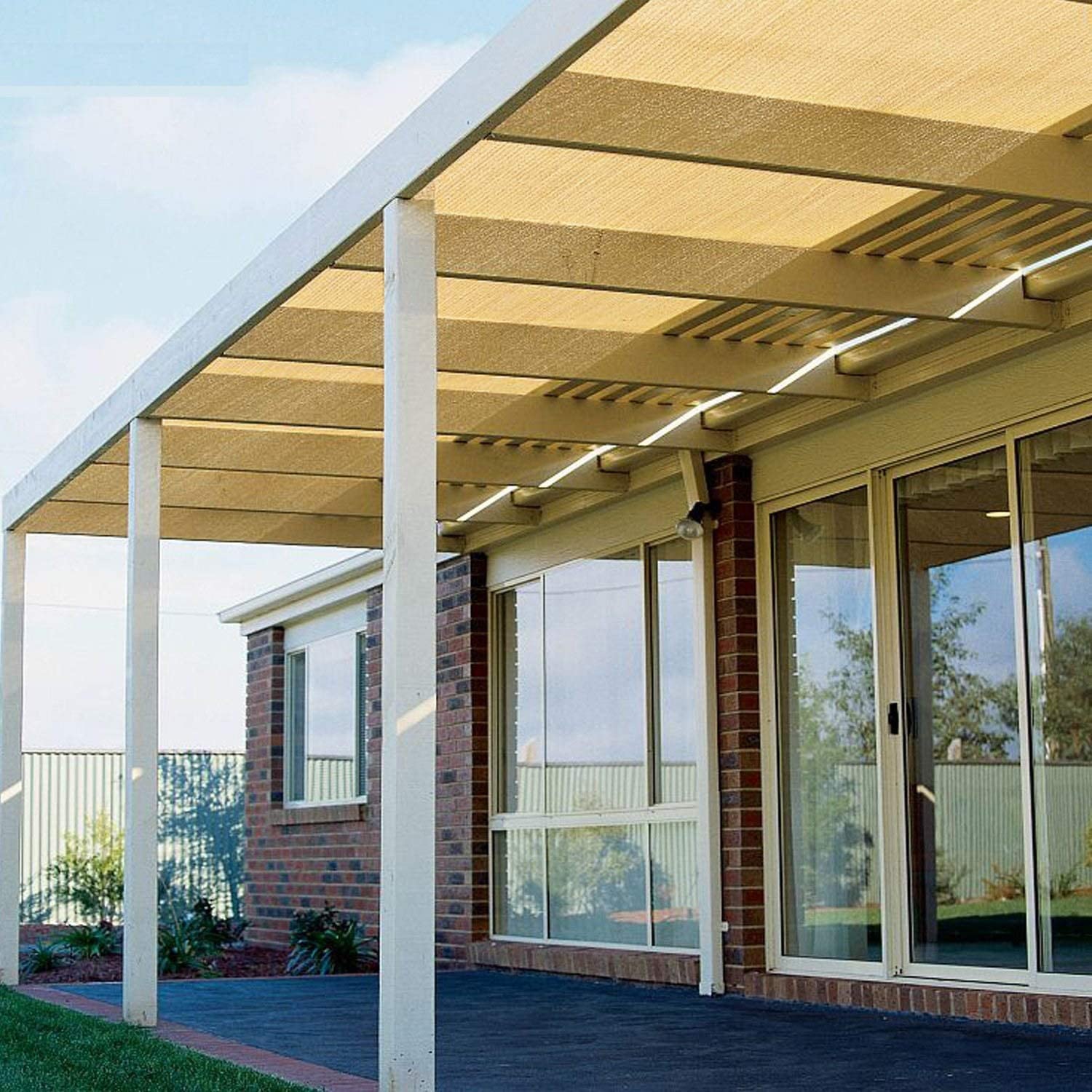 Shaded balcony with two white poles