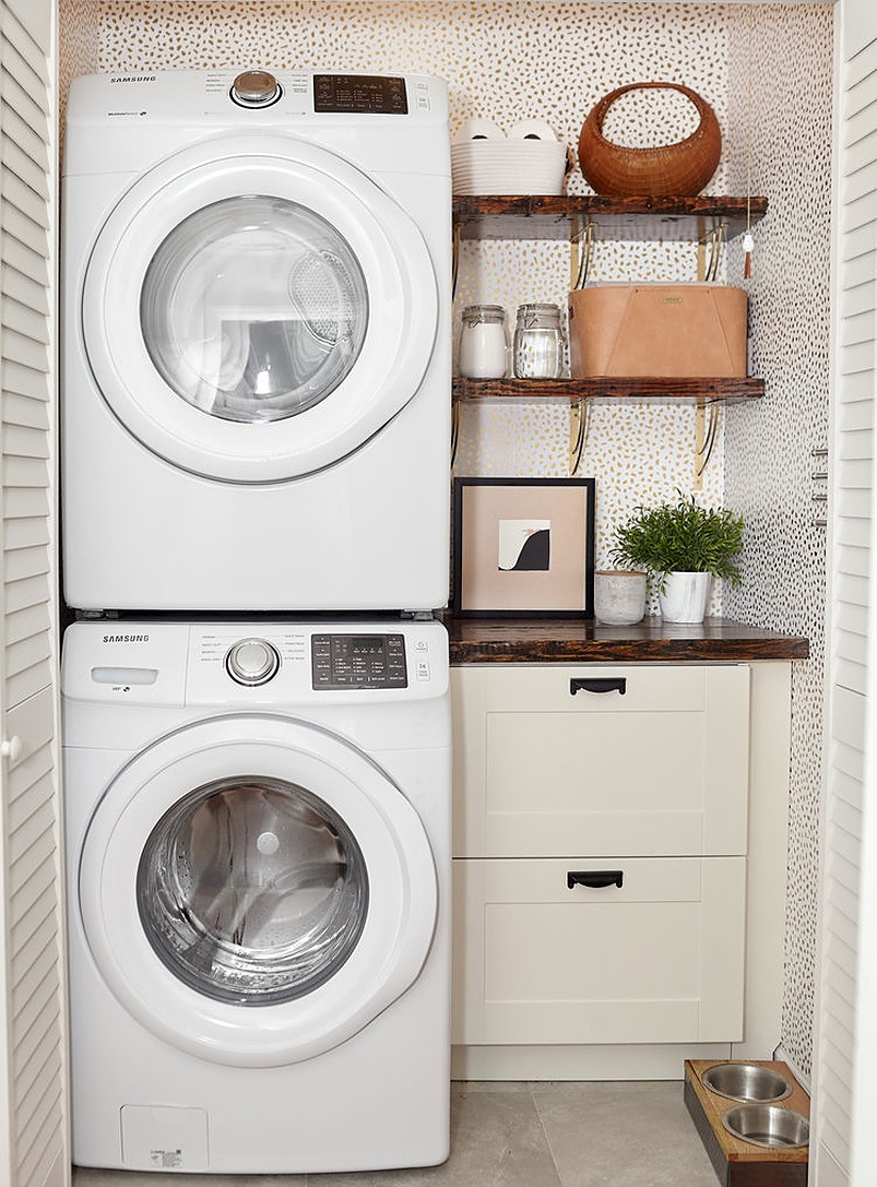 Stack up washer and dryer beside cabinet and shelves