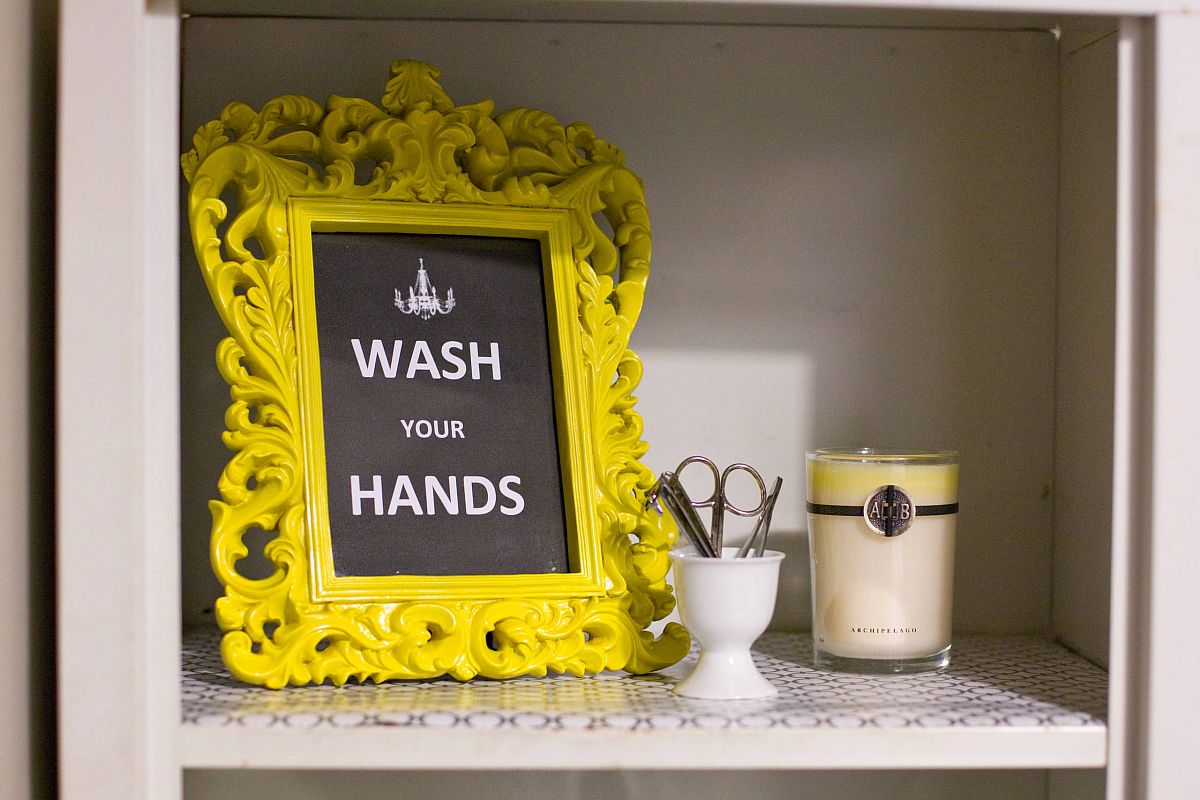 Tiny bathroom sign can fit even into the medicine cabinet with ease