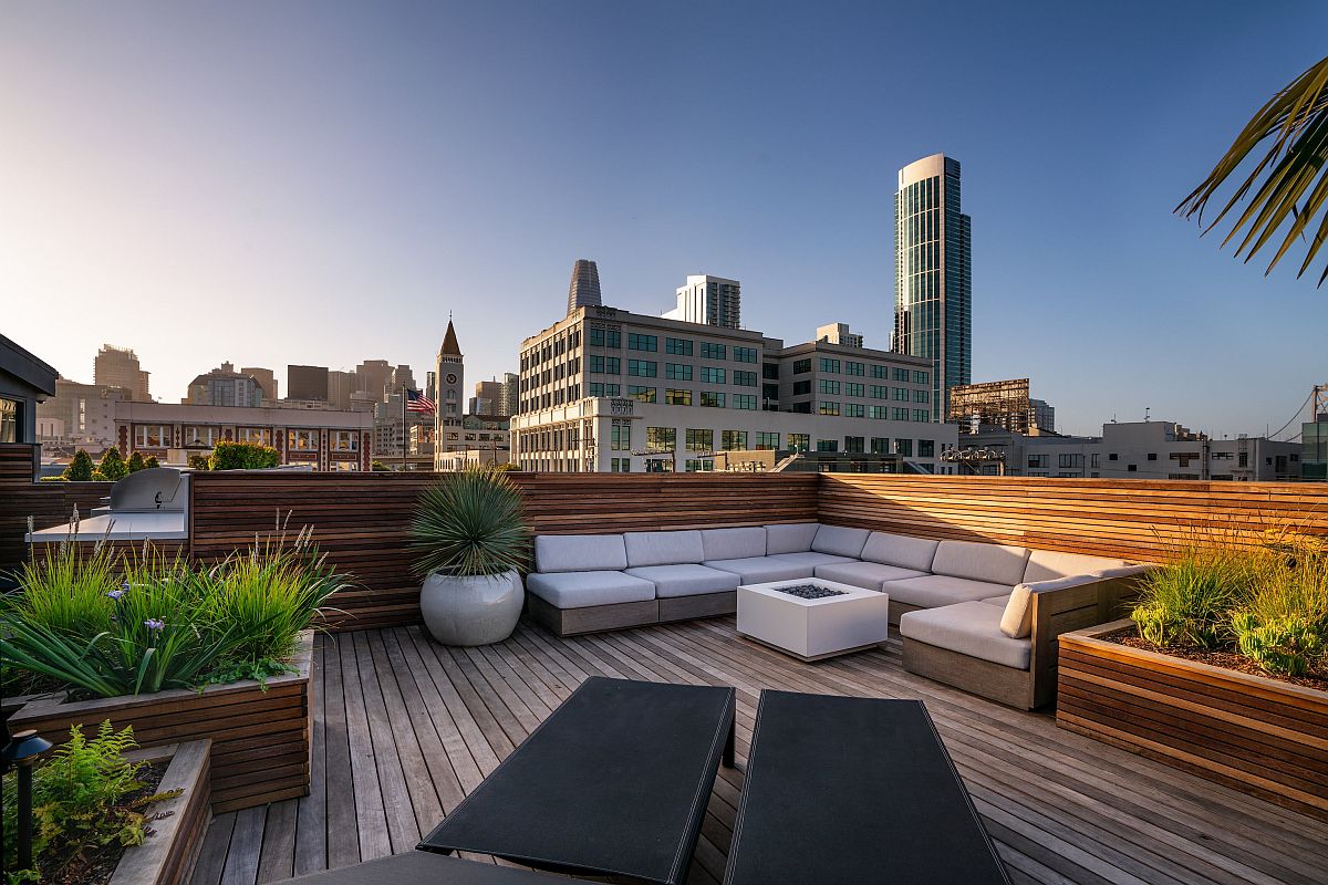 Urbane and private rooftop deck of San Francisco home with comfy seating