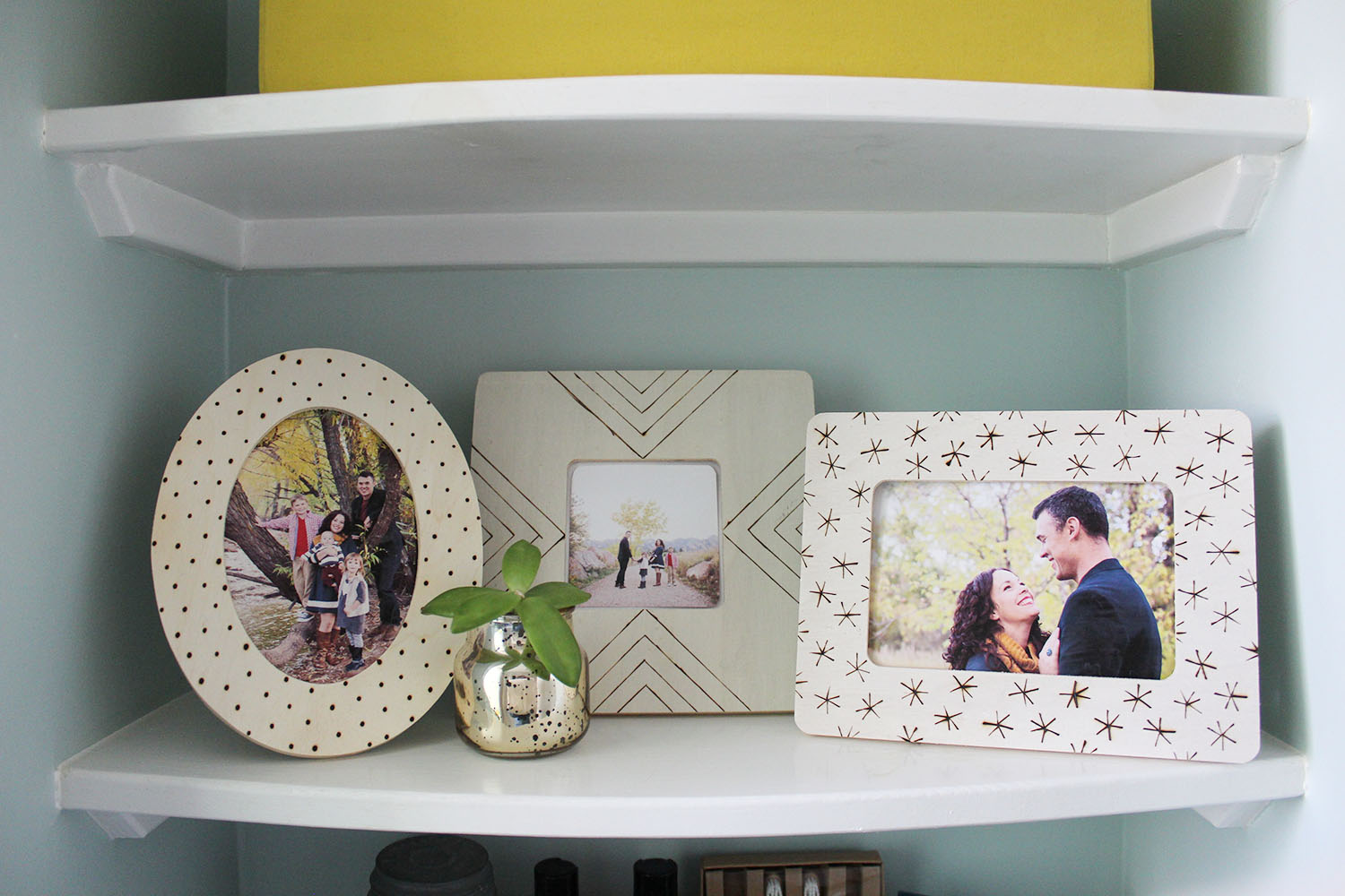 Wood burned photo frames in various shapes