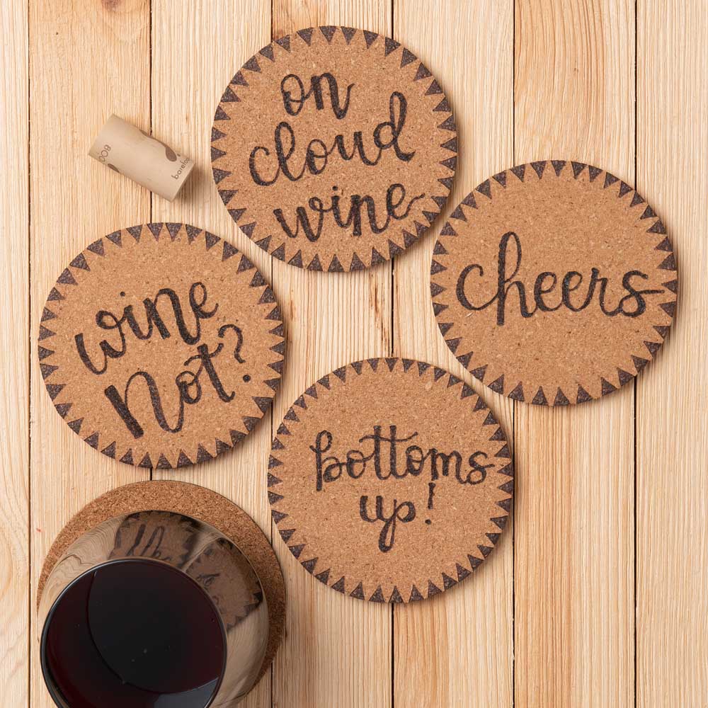 Wood burned round coasters with triangle boarders