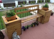 wooden bench with attached planter