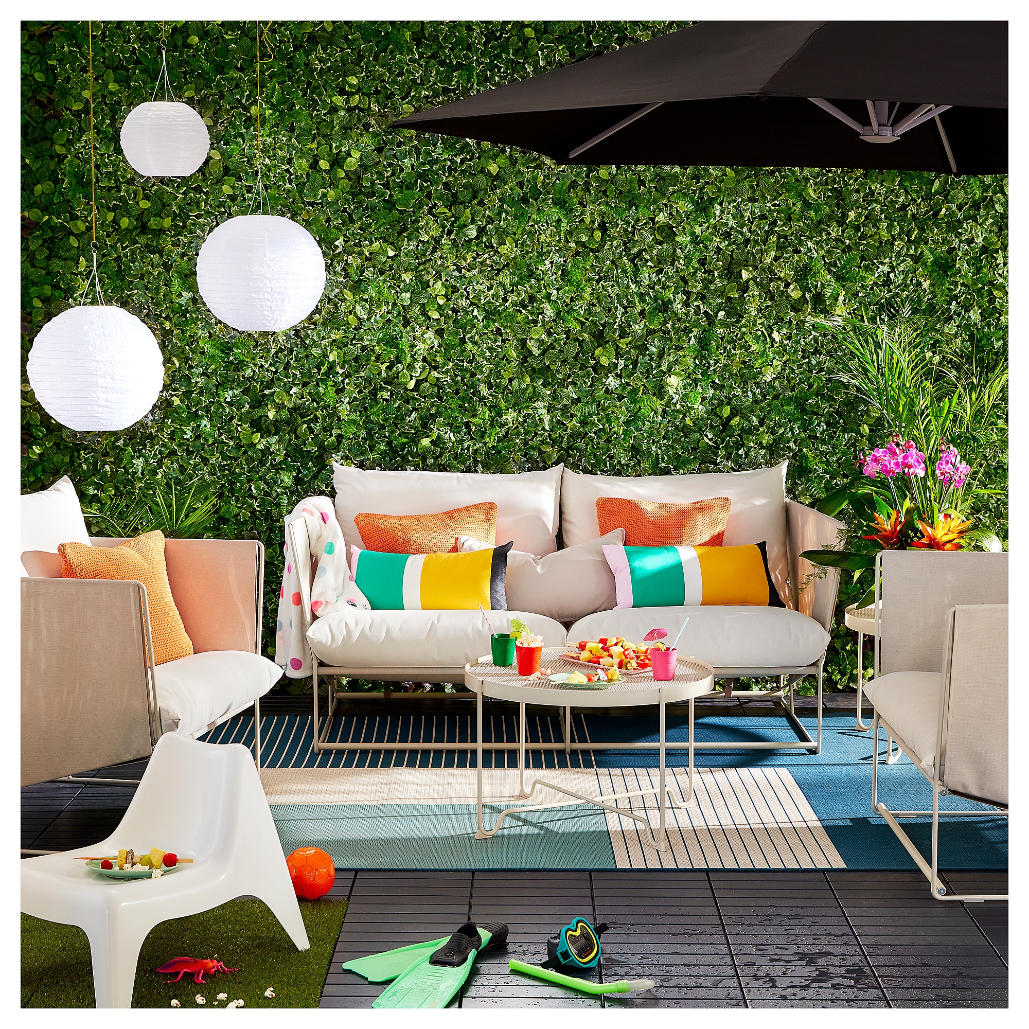 Ikea Patio Decor Trendy Color Cushions and Lanterns