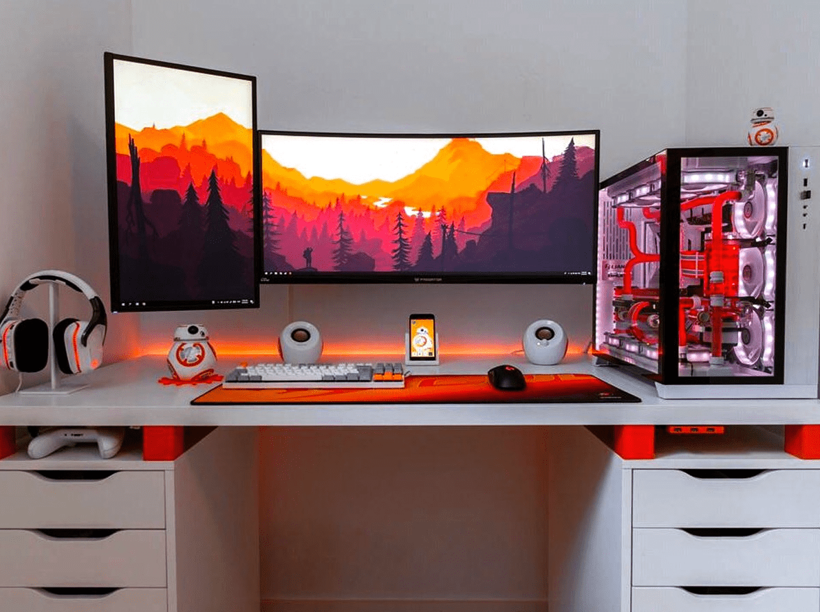 bright white desk setup with orange and red accents