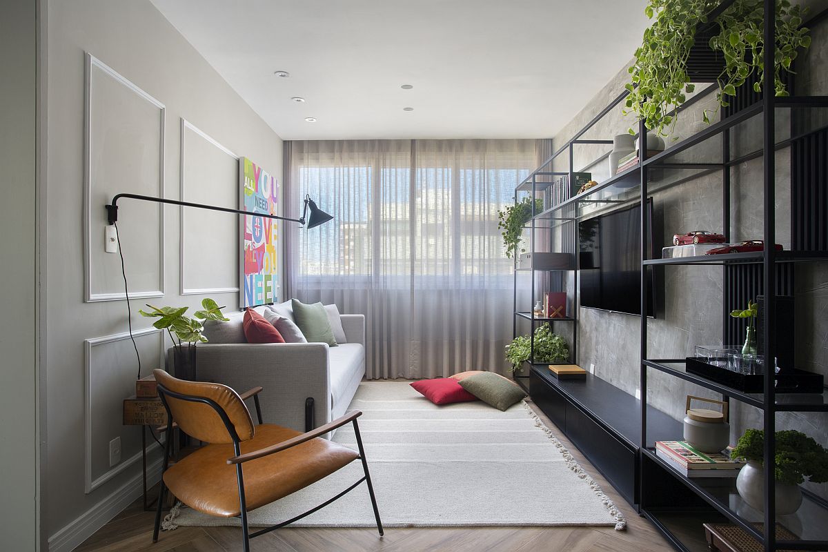 space-savvy-and-stylish-living-area-with-greenery-industrial-shevles-and-walls-of-gray-60709