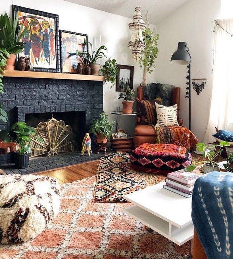 boho living room setup with black fireplace