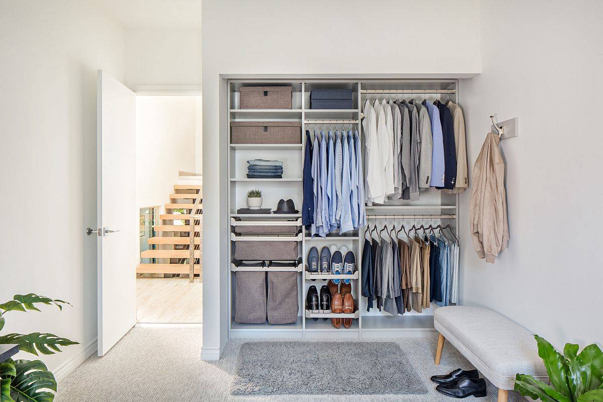 Boxes, shelves and hangers combined to create an extensive men's wardrobe