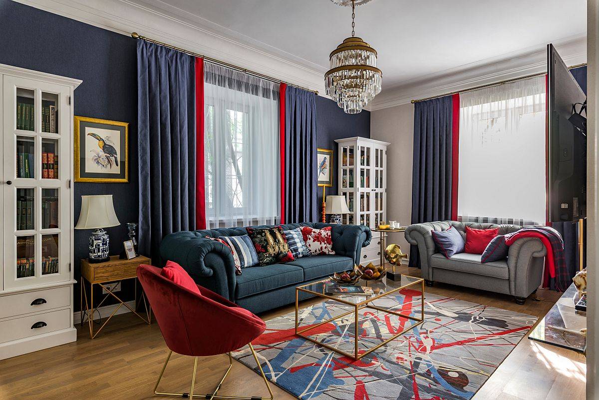 Brilliant splashes of blue combined with red accents in the contemporary living room