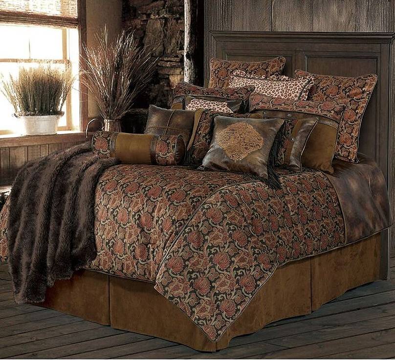 Brown bed with leather cushions in brown hues and patterns