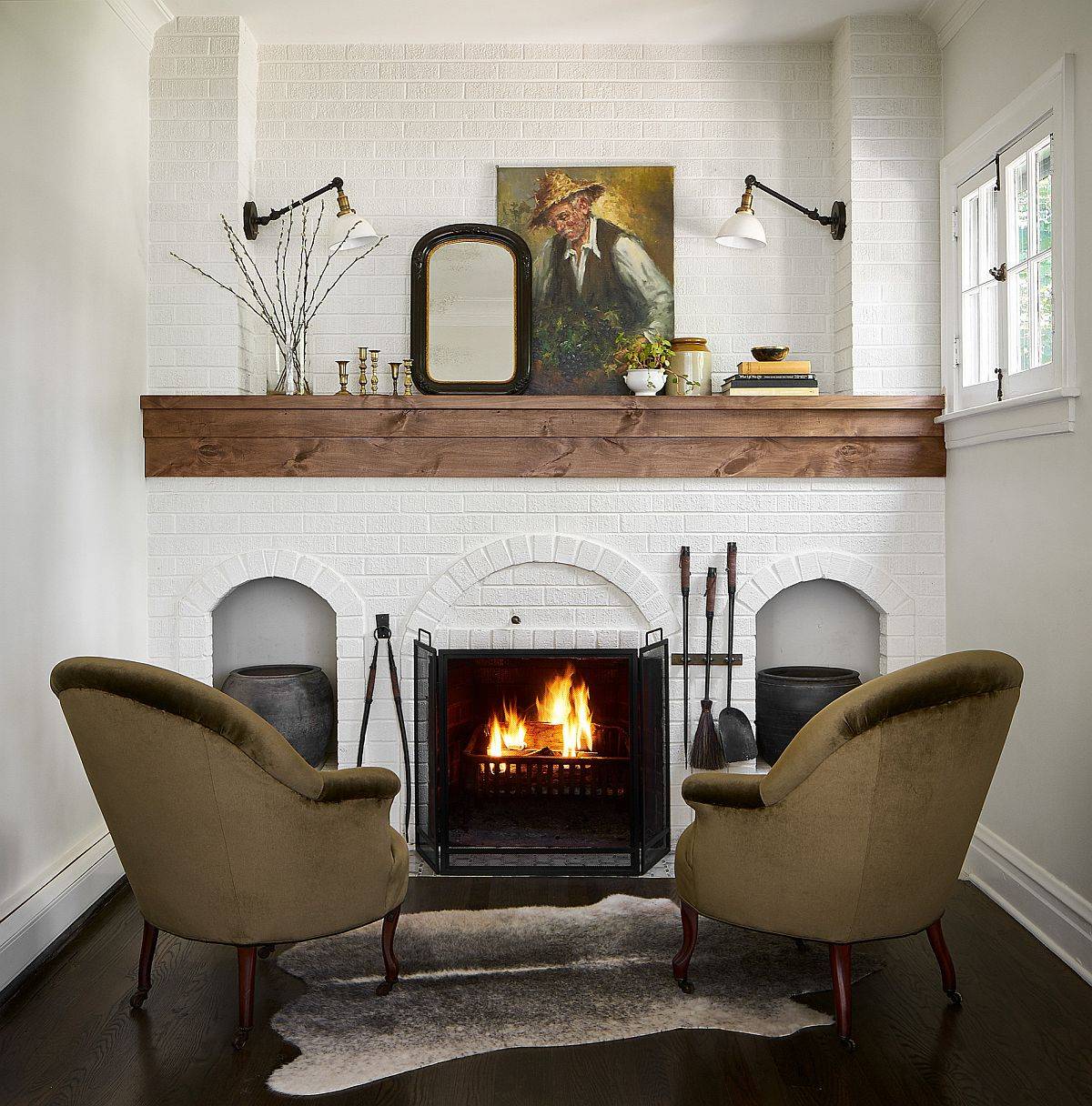 Fireplace becomes the focal point of this small English cottage style living room