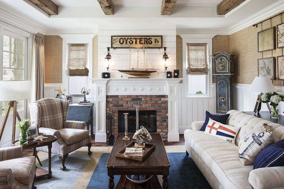 Gorgeous modern beach style living room in white with blue carpet and brick fireplace