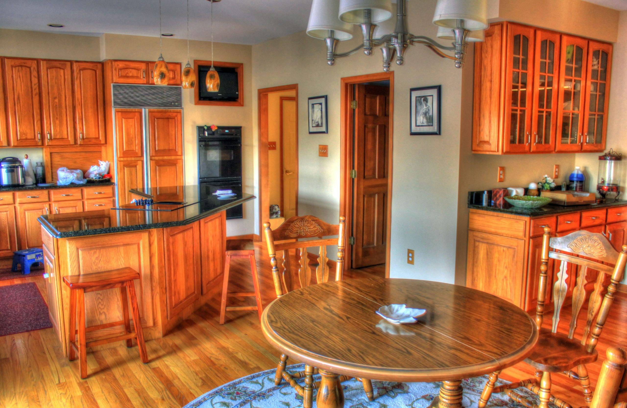 Home interior in hardwood with table and chairs