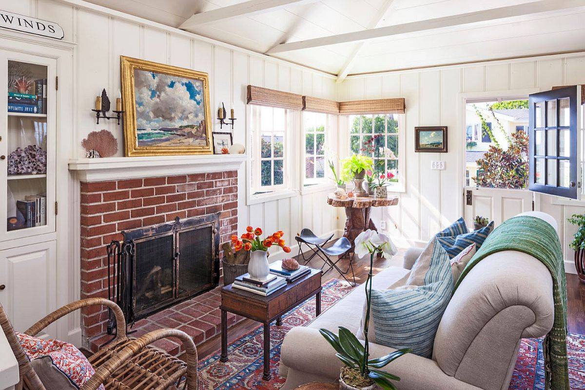 Light-filled and beautiful modern beach style living room with fabulous brick fireplace