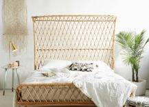 Rattan bed with potted plant on the side