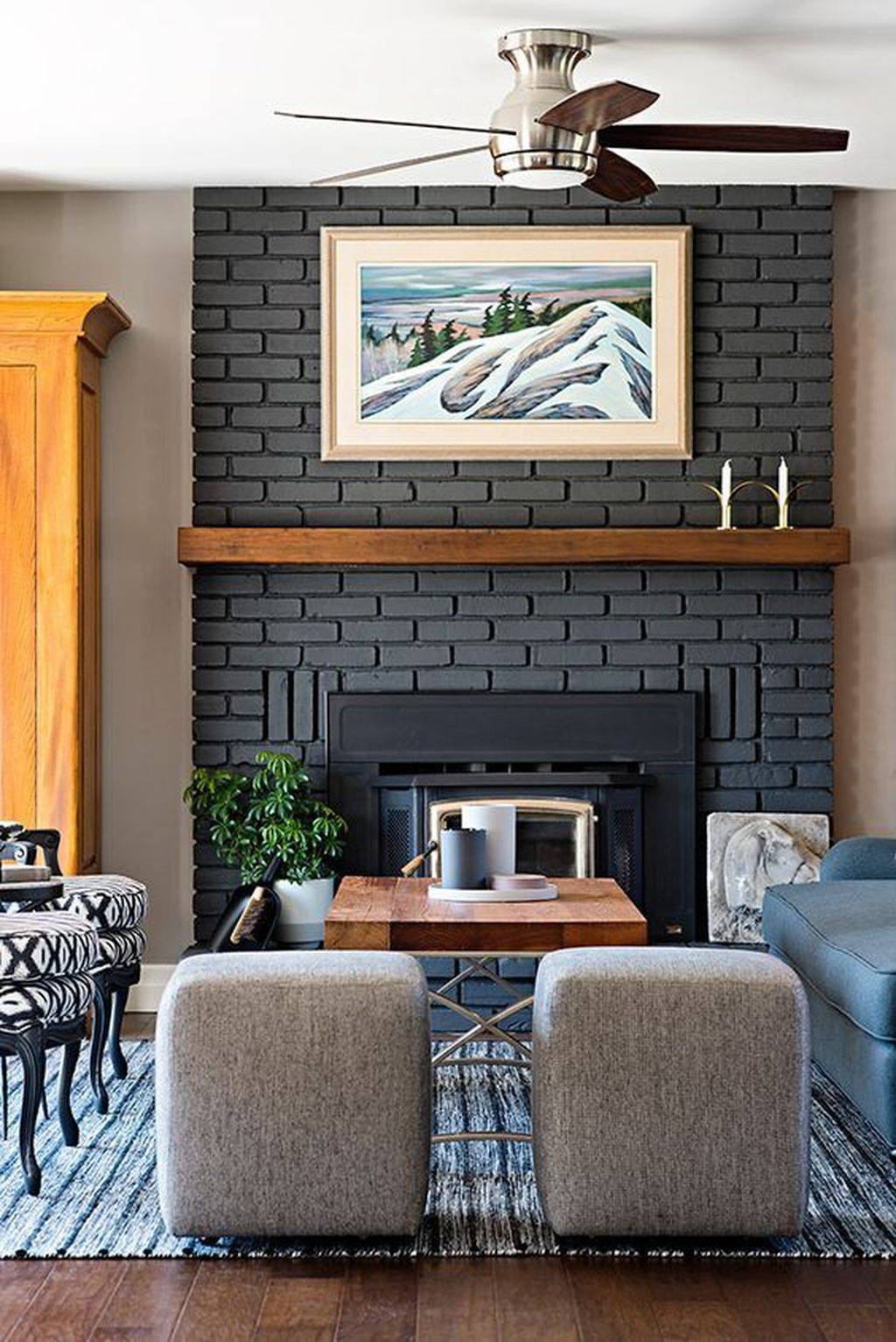 floor to ceiling black brick fireplace