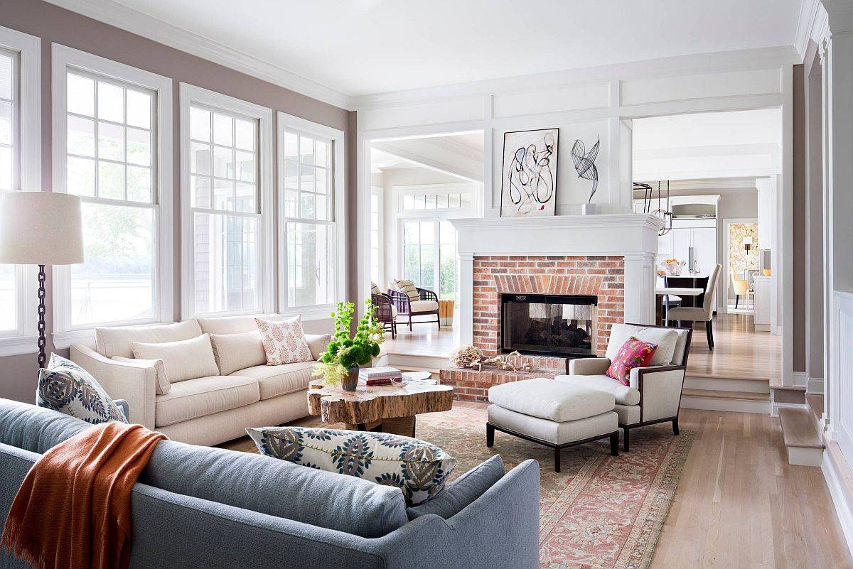 Visual and textural contrast of the brick fireplace makes instant impact in this modern living space