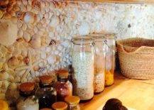 Wall made of shells and spices in jars