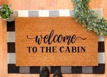 Welcome to the cabin rug on the floor