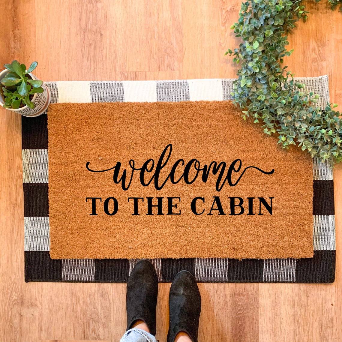 Welcome to the cabin rug on the floor