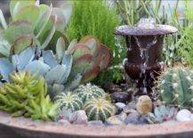 succulents surrounding water fountain