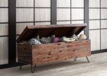 Assorted cushions inside wood storage bench