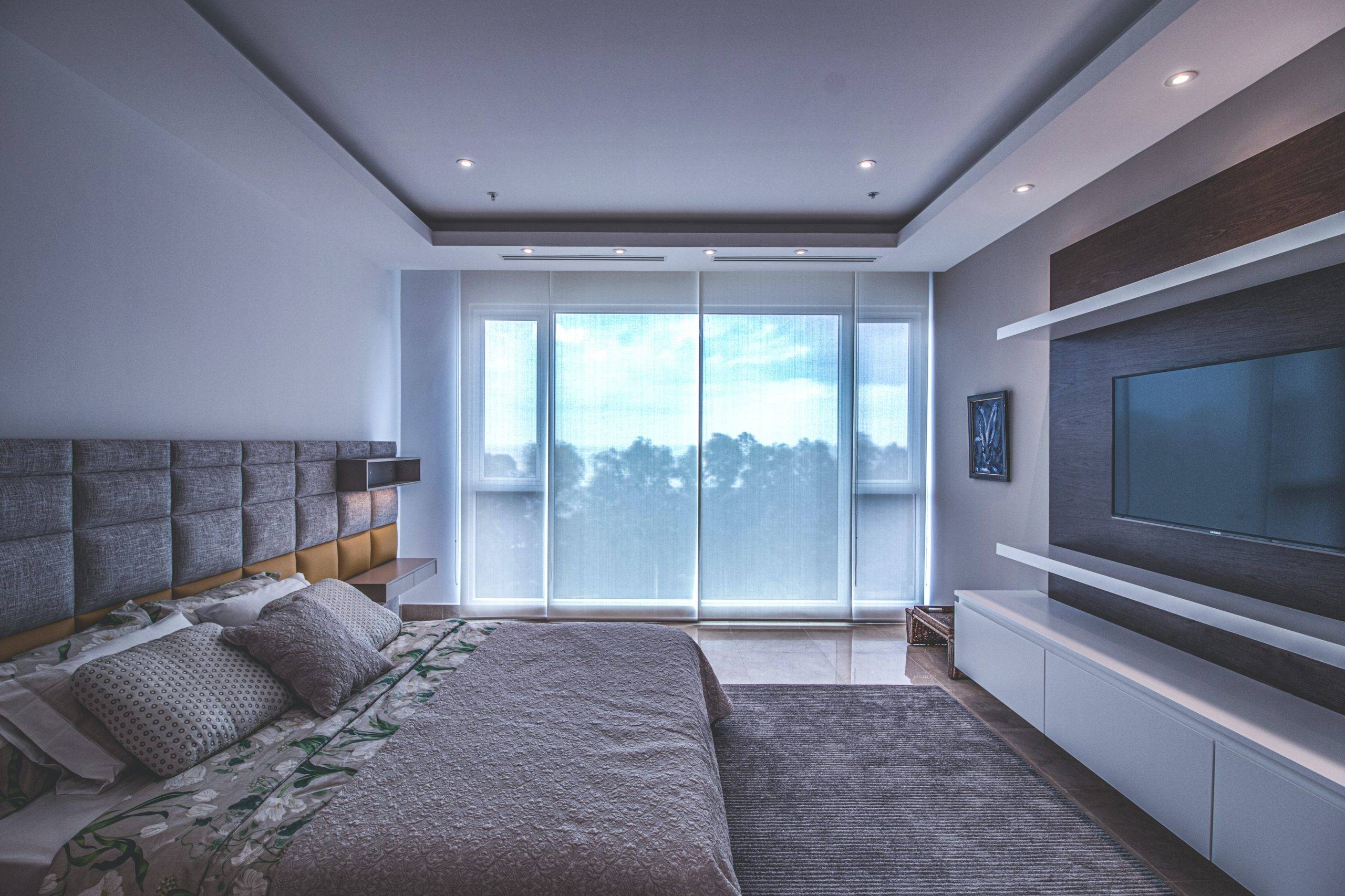 Bedroom with large windows