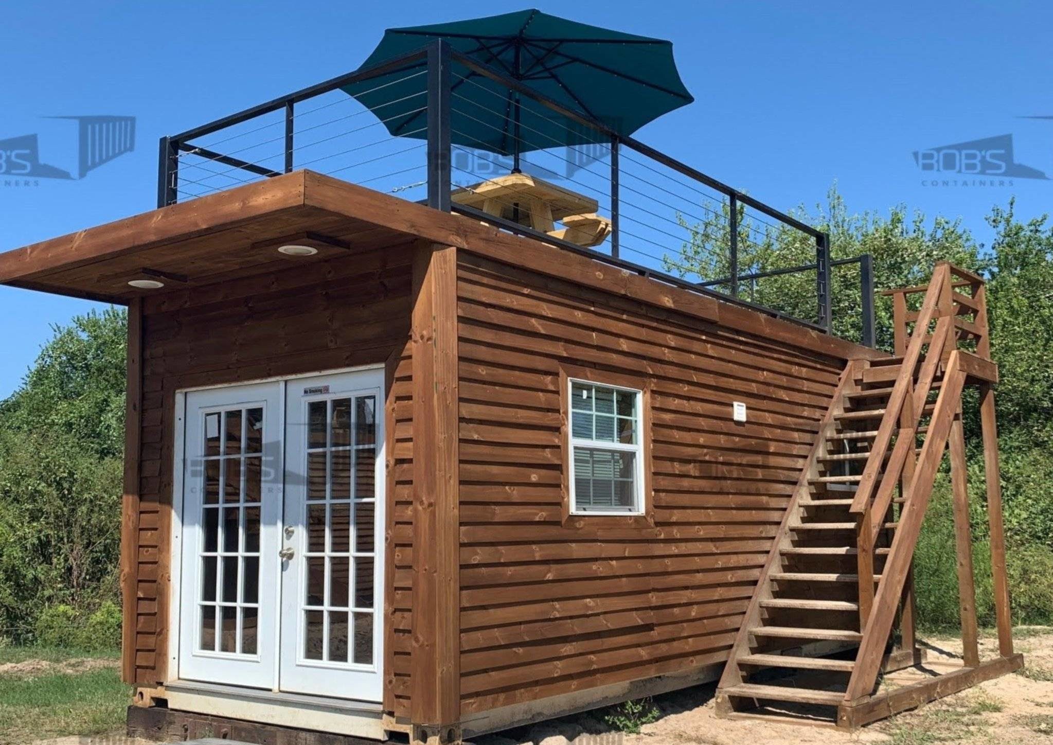 Container house with roof deck